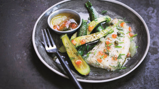 Plat du Mardi 24/02 - Filet de merlu, façon pissaladière, courgettes rôties