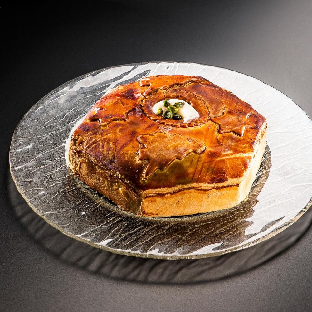 Tourte de Noël au foie gras et à la viande de canard