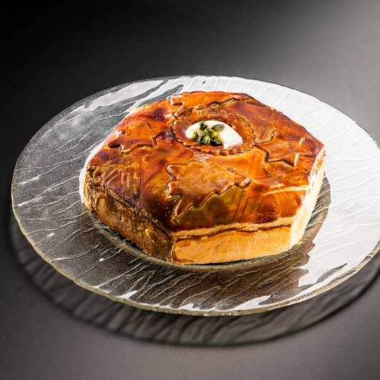 Tourte de Noël au foie gras et à la viande de canard